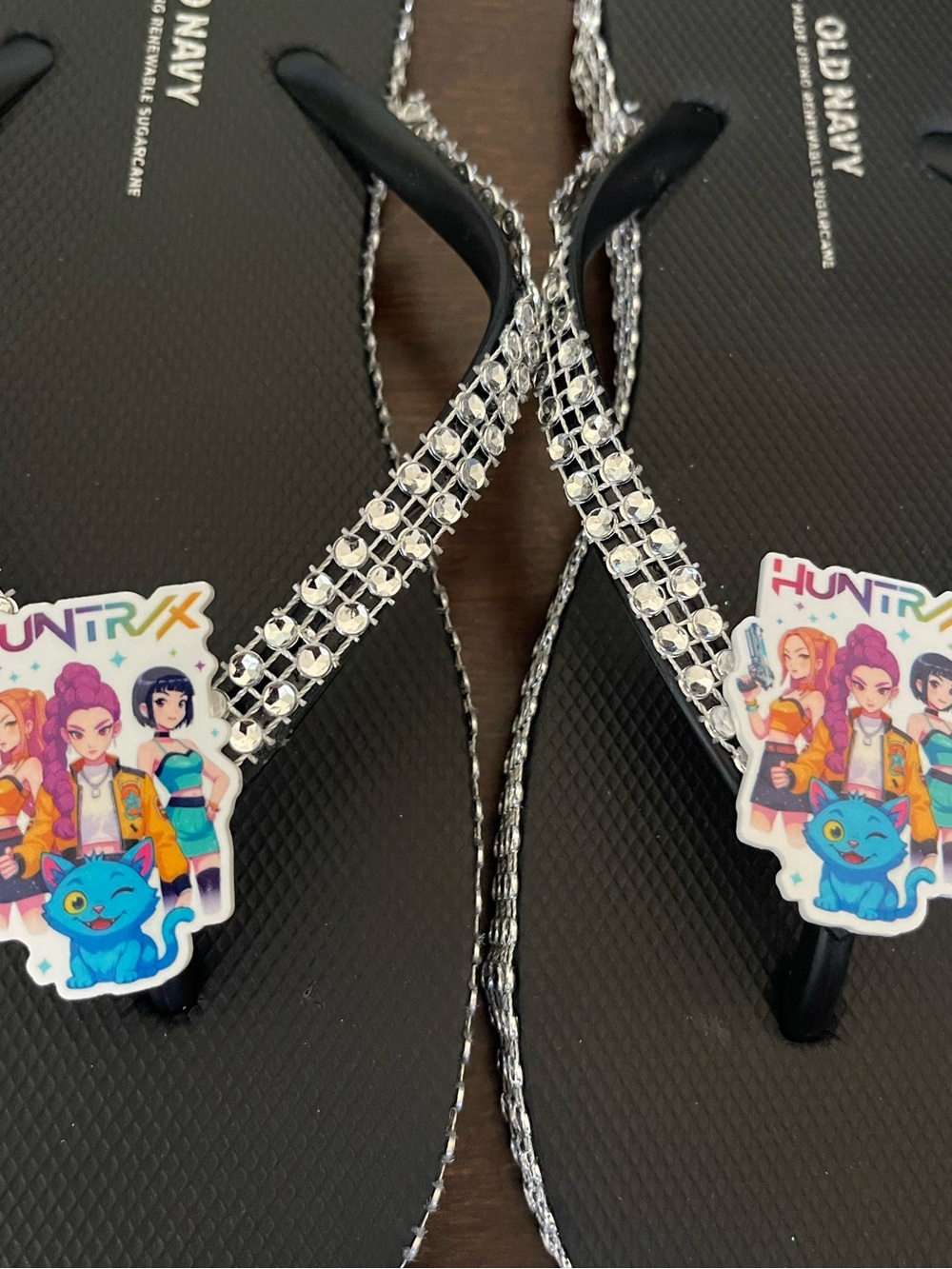 Old Navy Black Flip Flops with Rhinestone Straps and Colorful Cartoon Charms